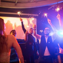 imgi_26_young-people-with-sparklers-at-awesome-party-2025-03-05-15-55-33-utc-1-scaled